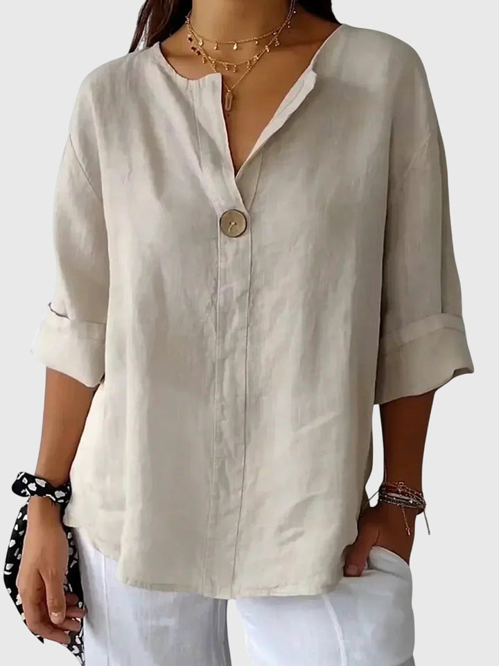 AURORA | BLUSA IN LINO CON BOTTONE DECORATIVO