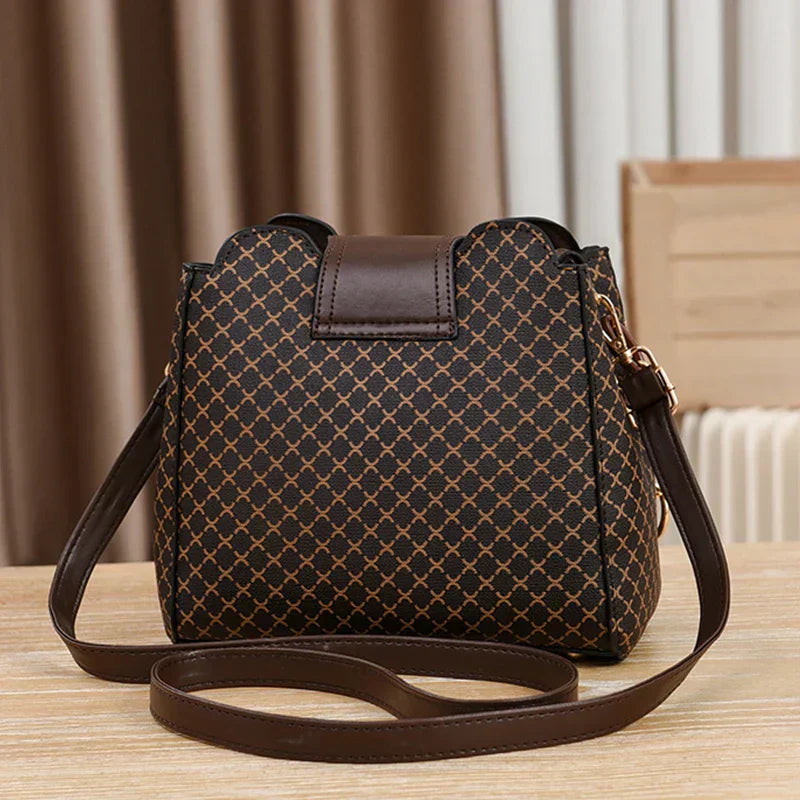 DALIA | BORSA A TRACOLLA ELEGANTE CON DETTAGLI DORATI E FANTASIA RAFFINATA