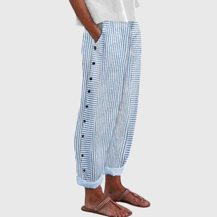 BIANCA | PANTALONI IN LINO A RIGHE CON BOTTONI DECORATIVI