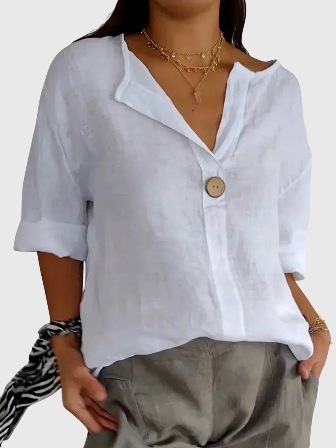 AURORA | BLUSA IN LINO CON BOTTONE DECORATIVO
