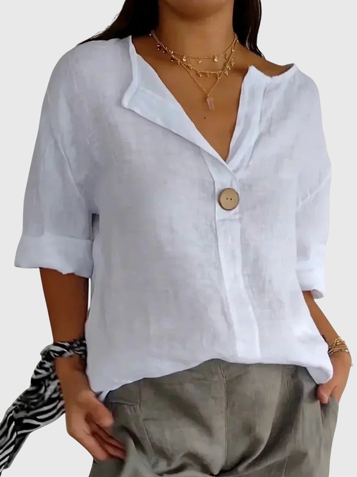 AURORA | BLUSA IN LINO CON BOTTONE DECORATIVO